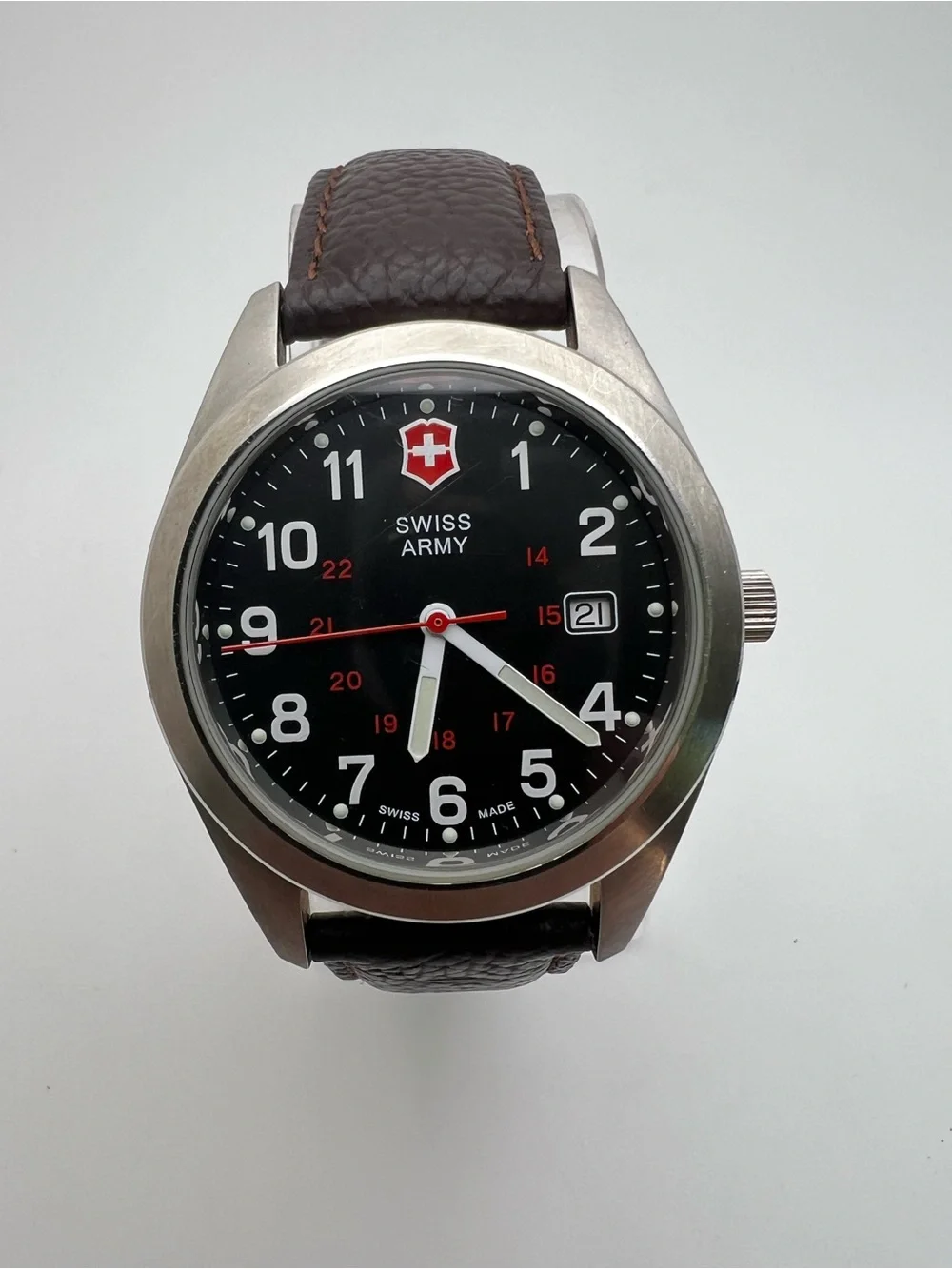 Victorinox Black Dial Watch with Brown Leather Strap and Red Accents